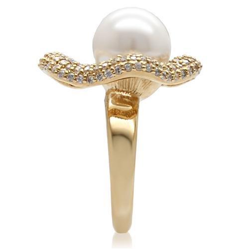 1W103 Gold Brass Ring featuring a beautiful synthetic pearl in white, showcasing its elegant design and luxurious finish.