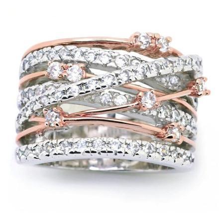 Elegant Crystal Crossover Ring in silver and rose gold tones, featuring sparkling crystals and a unique crossover design.