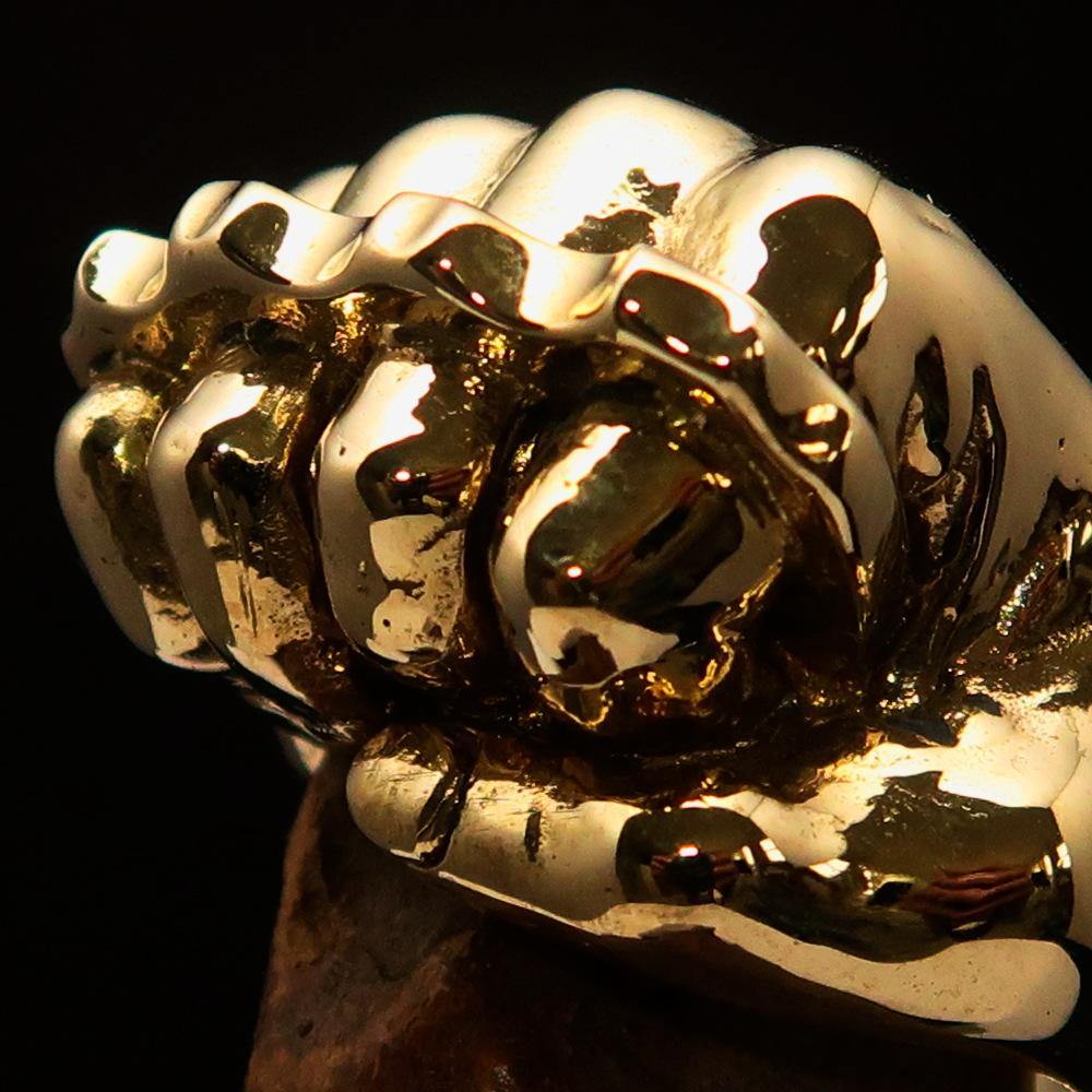 Solid Brass Biker Ring Knuckle Duster Fist with antiqued and polished finish, showcasing its unique design and craftsmanship.