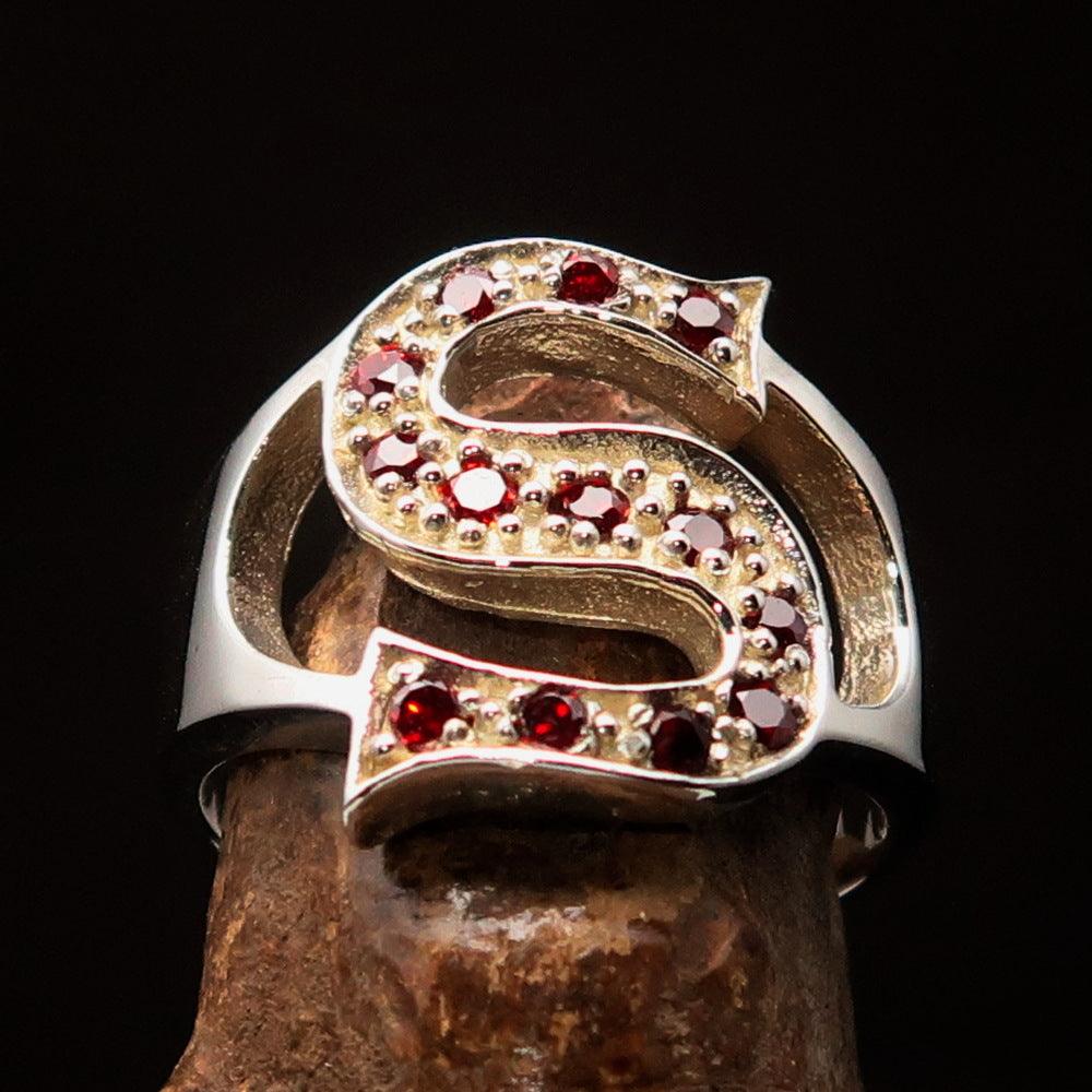 Excellent Crafted Initial Ring featuring a bold letter S with 13 red cubic zirconias set in solid sterling silver, showcasing a high-polished finish.
