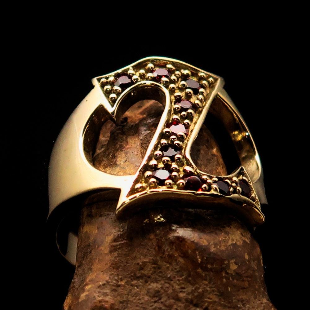 A beautifully crafted Initial Ring featuring a bold letter Z, adorned with 10 red Cubic Zirconias, made from solid brass with a shiny mirror polish finish.