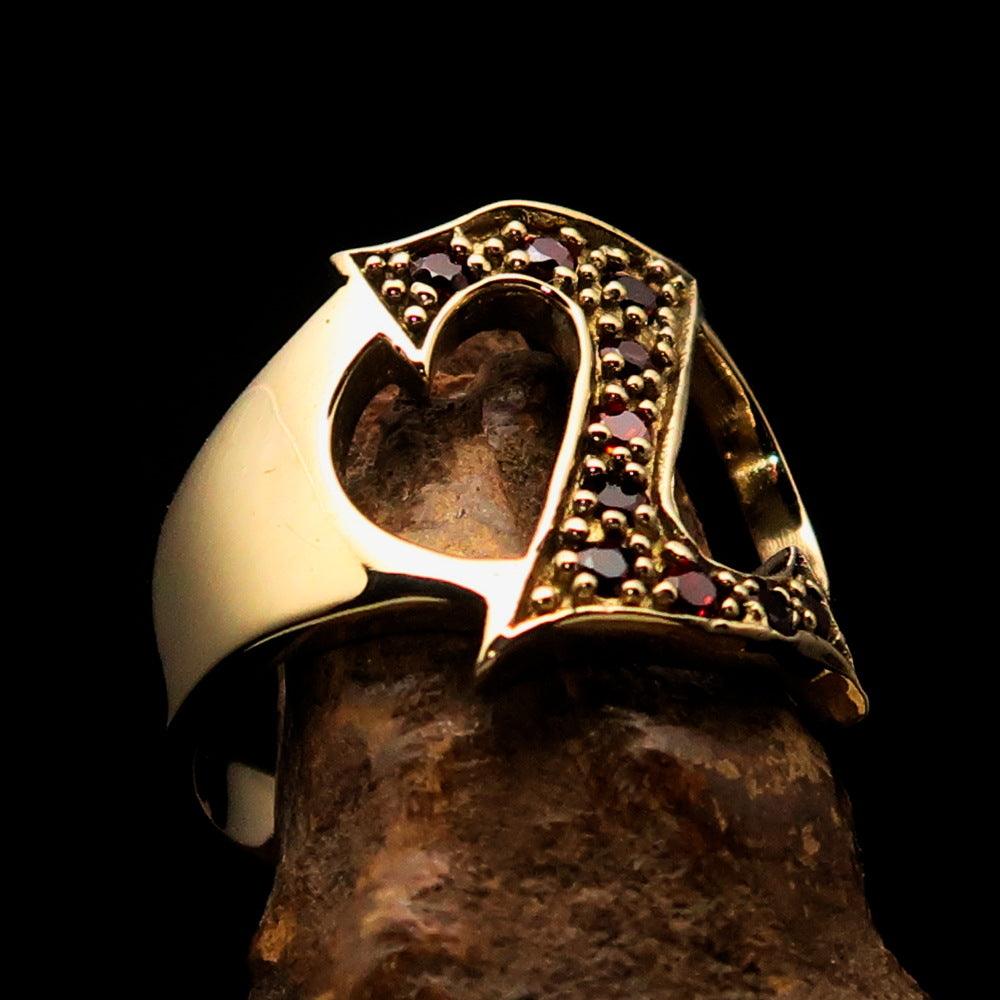 A beautifully crafted Initial Ring featuring a bold letter Z, adorned with 10 red Cubic Zirconias, made from solid brass with a shiny mirror polish finish.