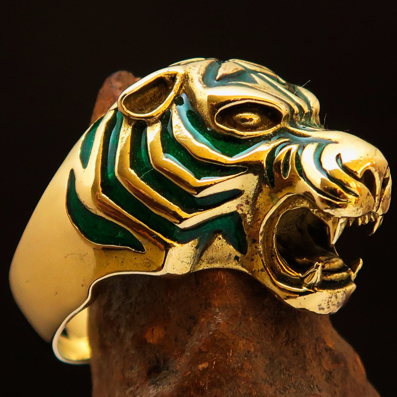 Men's animal ring featuring a male tiger design in solid brass with green enamel detailing, showcasing a high polished finish.