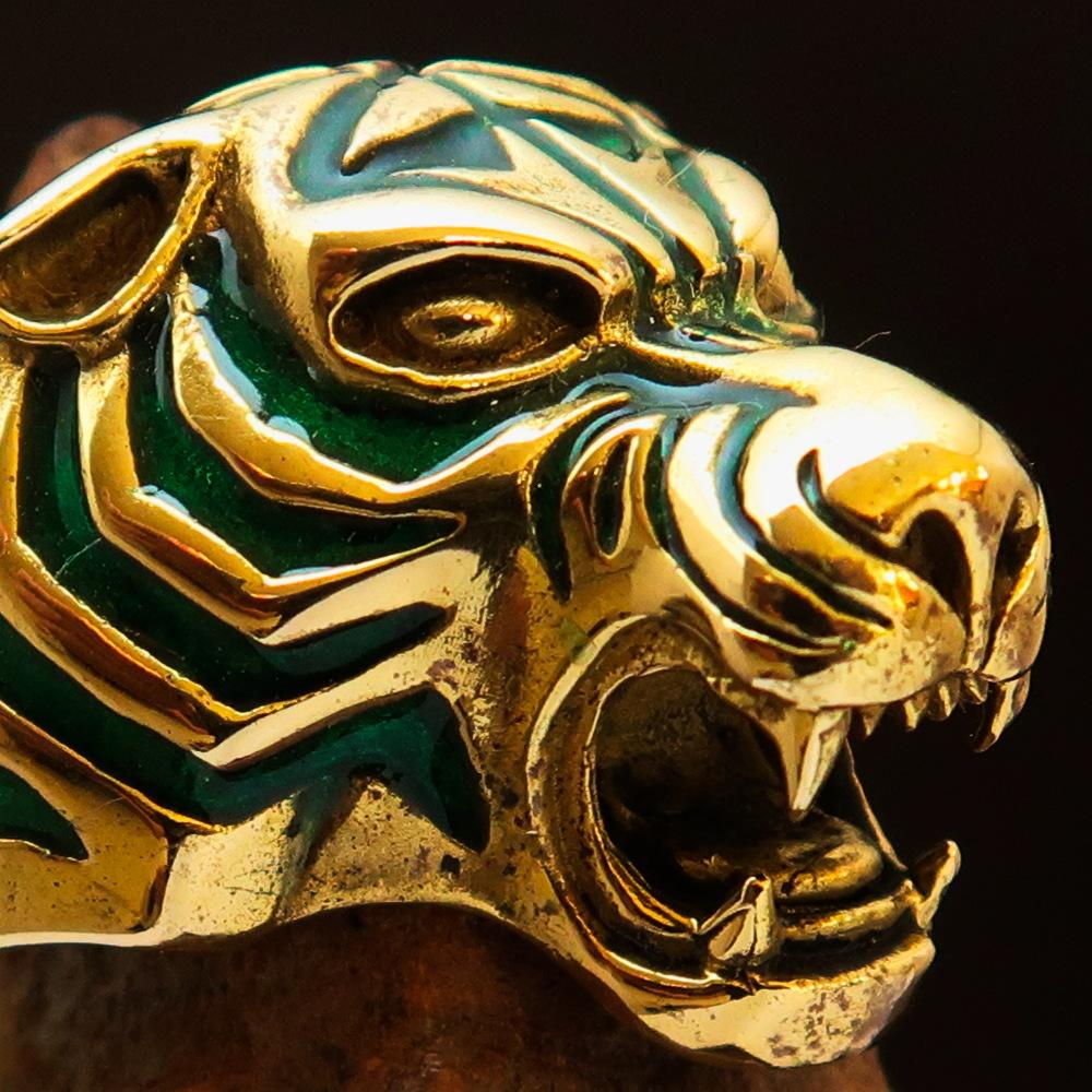 Men's animal ring featuring a male tiger design in solid brass with green enamel detailing, showcasing a high polished finish.