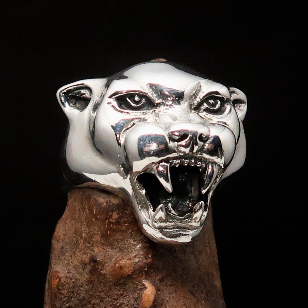 Men's sterling silver ring featuring a fierce panther design, showcasing intricate details and a polished finish.