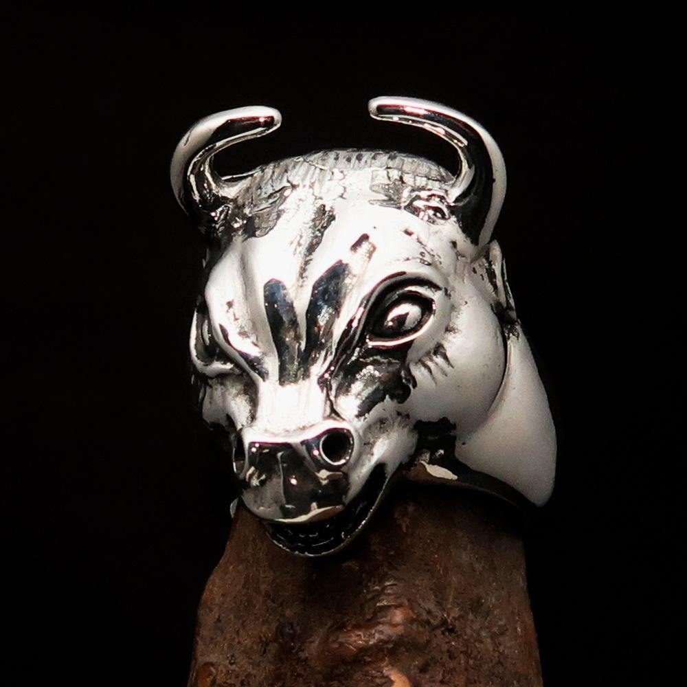 Men's antiqued Bull Head Ring made of Sterling Silver, featuring a detailed bull head design with a polished and antiqued finish.
