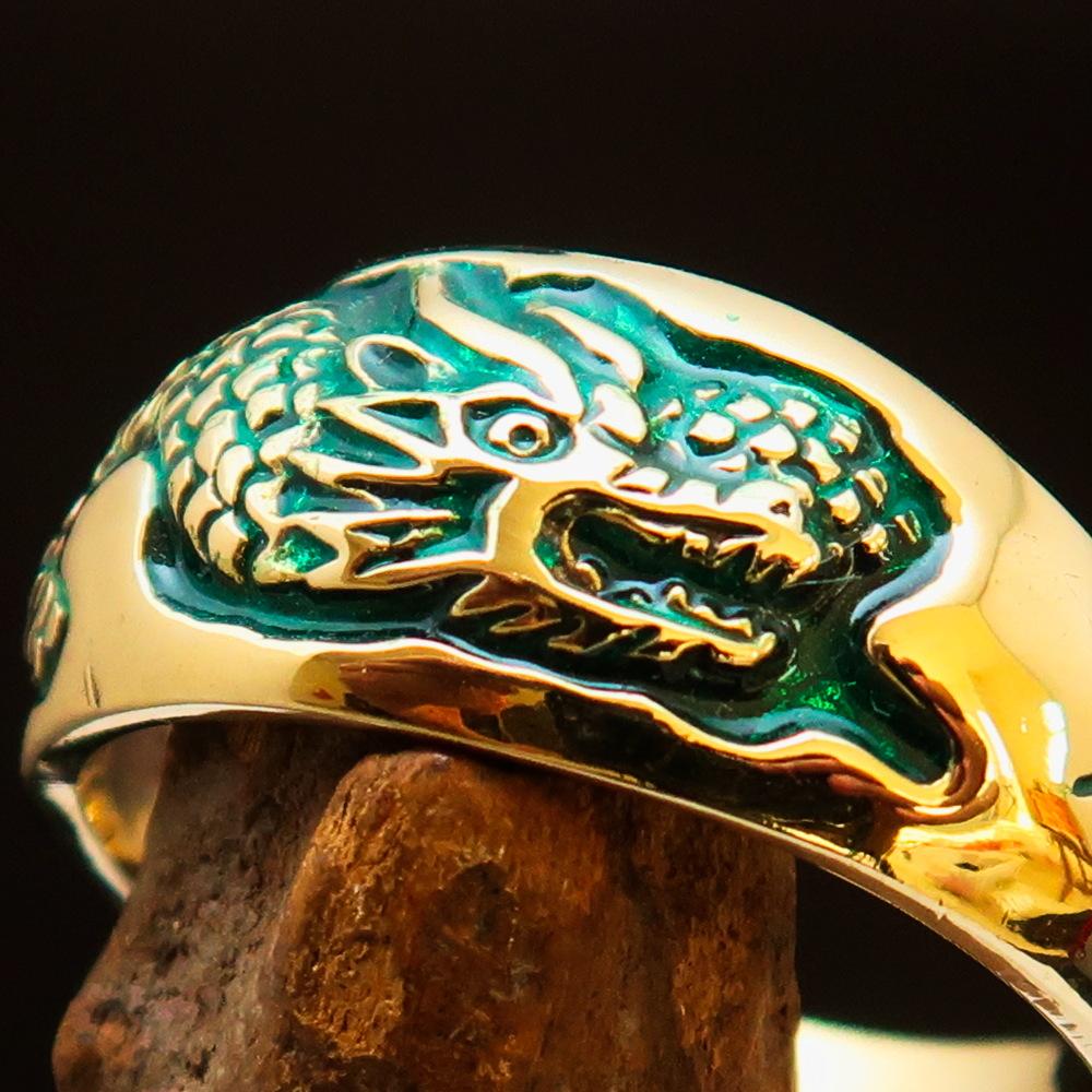 Men's Band Ring featuring a detailed dragon and snake design in solid brass with green enamel accents, showcasing a high polished finish.
