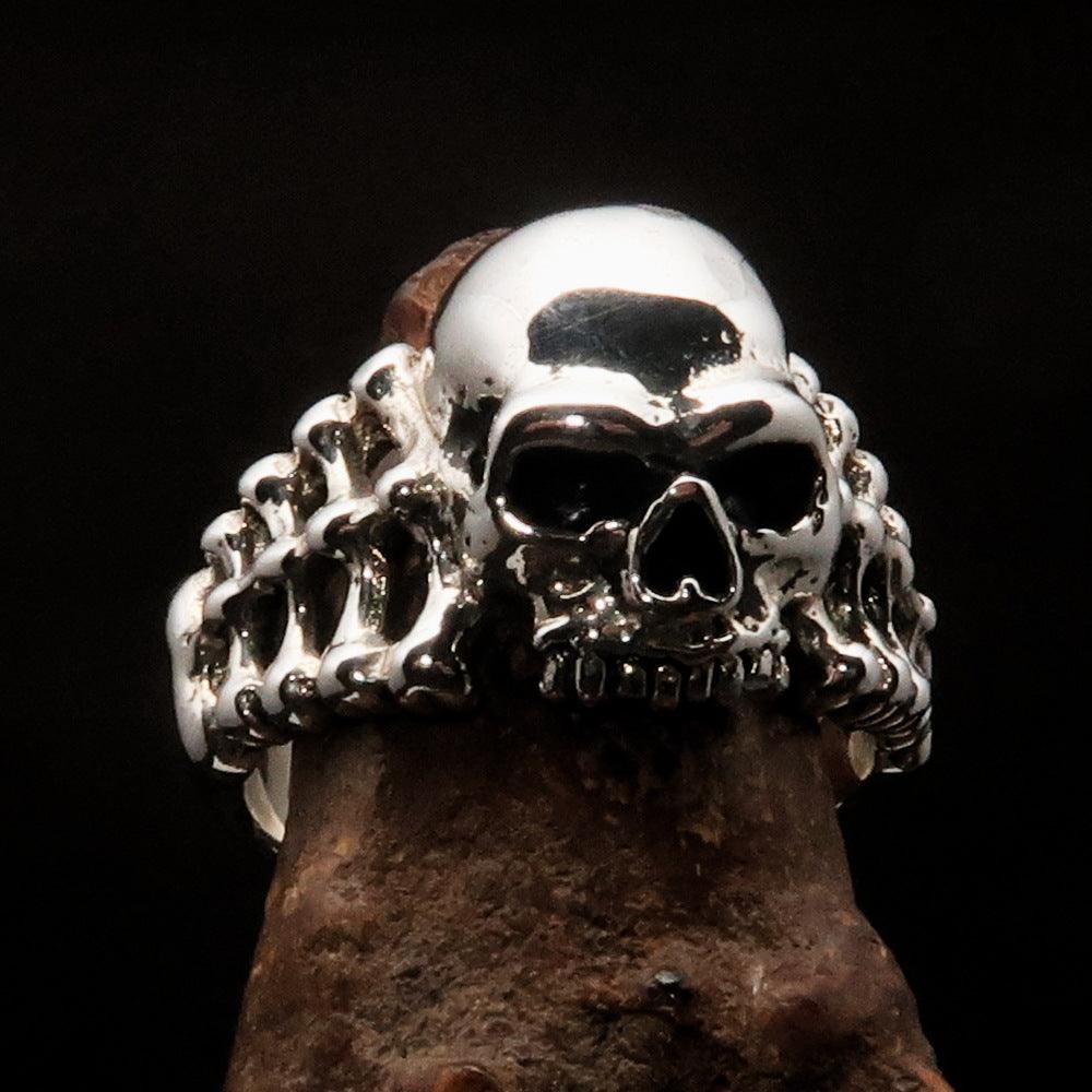 Men's Biker Ring featuring a Skull and Bones design, crafted from solid Sterling Silver with a high polished and antiqued finish.