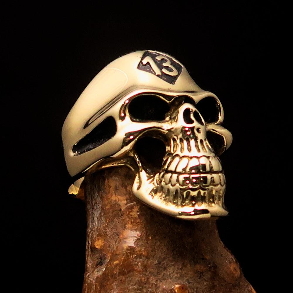 Men's Biker Skull Ring featuring black diamond accents and high polished brass finish, showcasing a bold skull design.