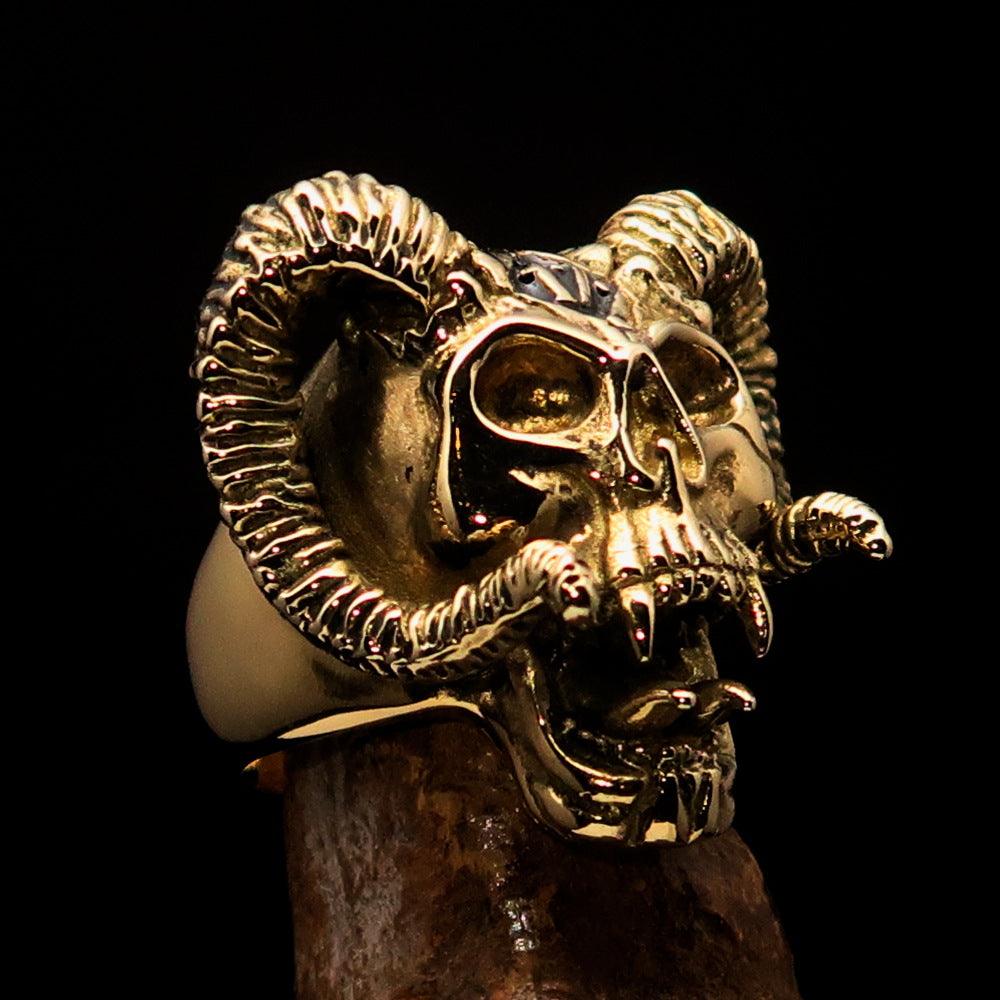 Men's black 1% Ram Skull Outlaw Biker Ring made of solid brass with a polished finish and black enamel detailing.