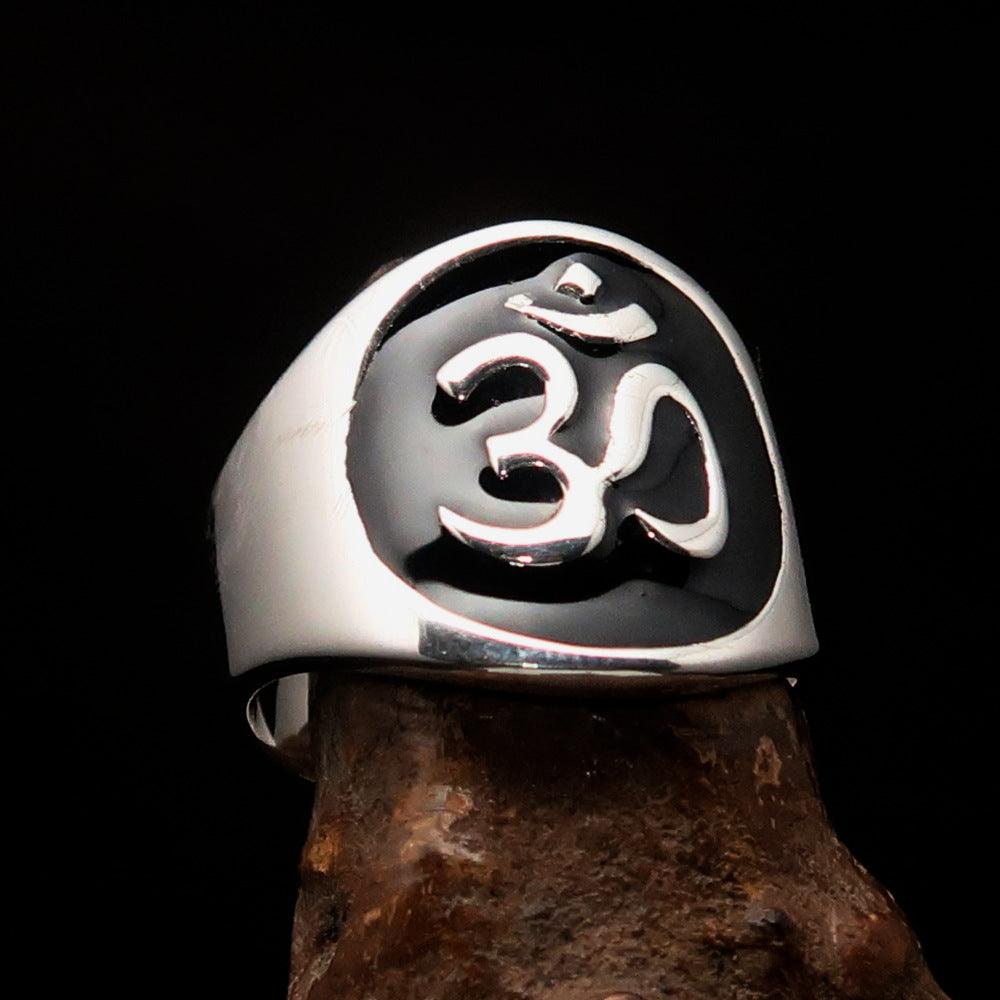 Men's black Aum Buddhist ring made of high-polished sterling silver with enamel finish, showcasing the Aum symbol.