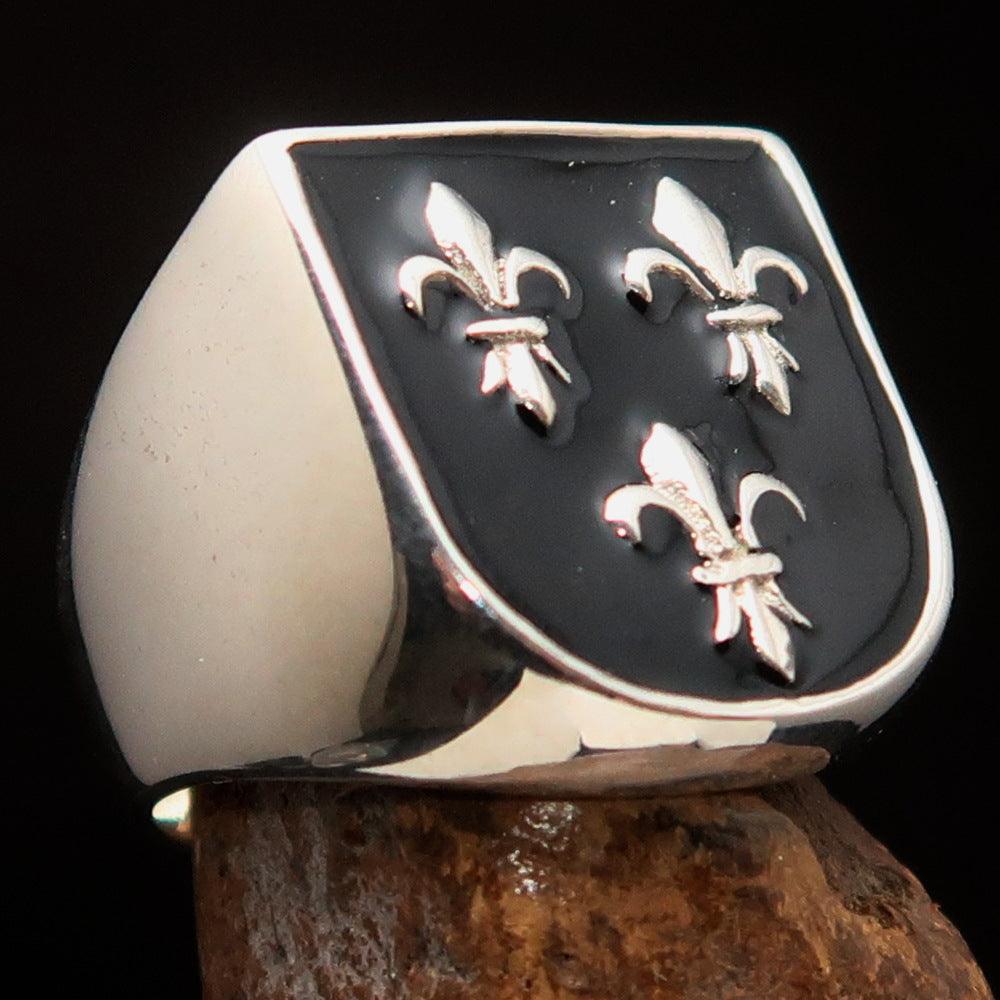 Men's black Fleur de Lis Coat of Arms Ring made of solid sterling silver with a polished enamel finish, showcasing intricate design details.