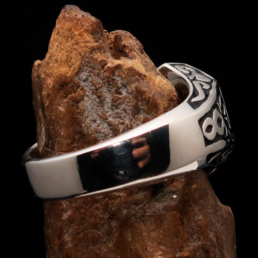 Men's Black Outlaw Biker Ring 1% made of solid sterling silver with high polish and enamel finish, showcasing its unique design and quality.