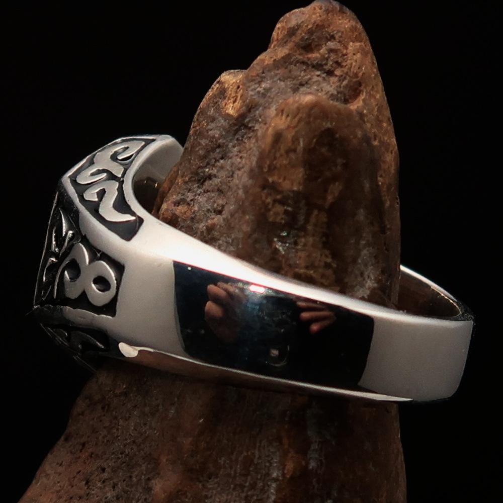 Men's Black Outlaw Biker Ring 1% made of solid sterling silver with high polish and enamel finish, showcasing its unique design and quality.