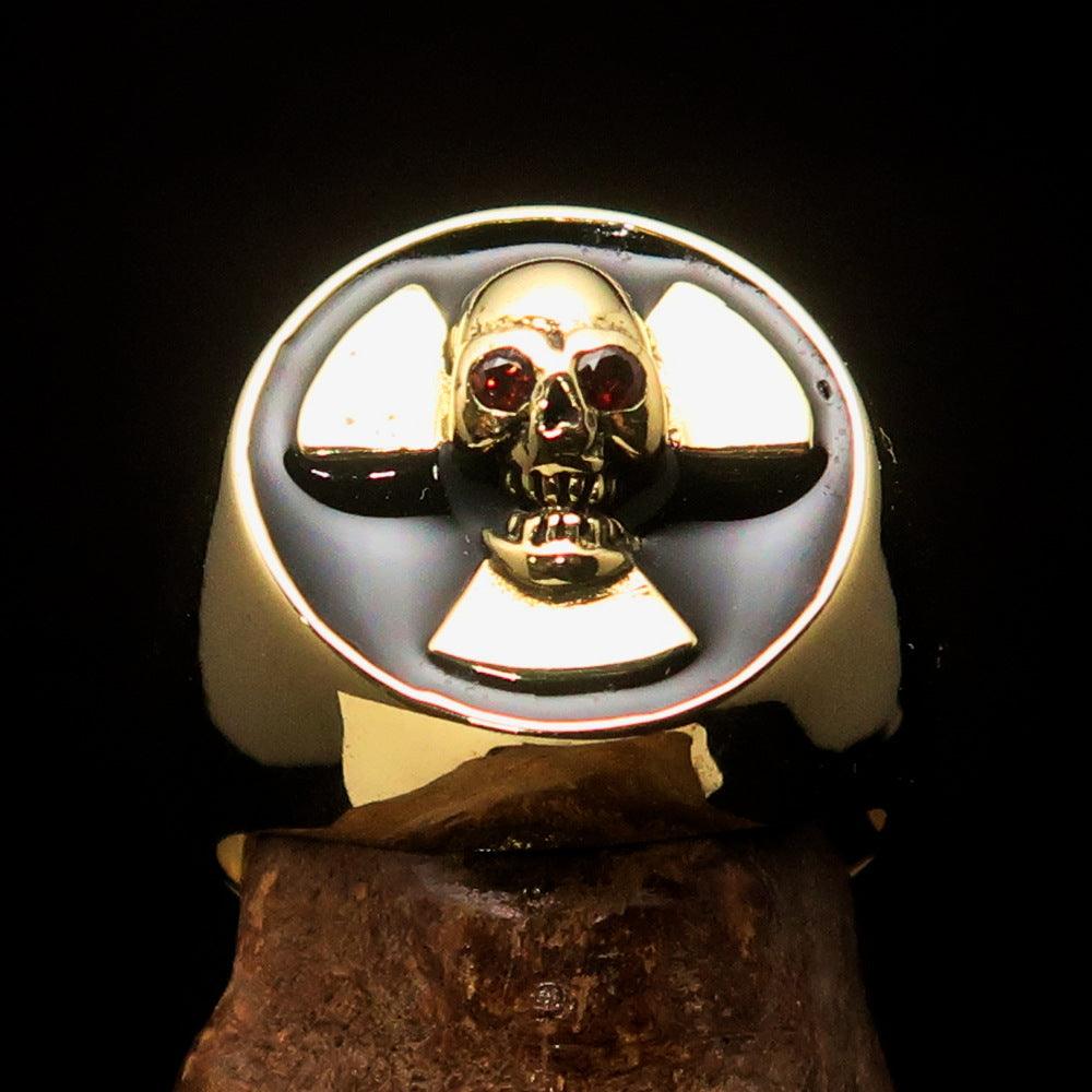 Men's black radioactive skull ring featuring red cubic zirconia eyes, crafted from solid brass with a high polished black enamel finish.