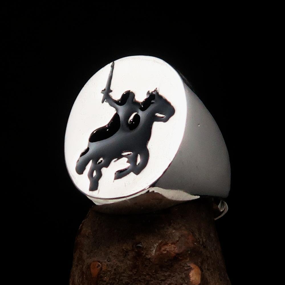 Men's Black Riding Knight Ring made of solid sterling silver with a polished finish and black enamel inlay, showcasing its unique design.