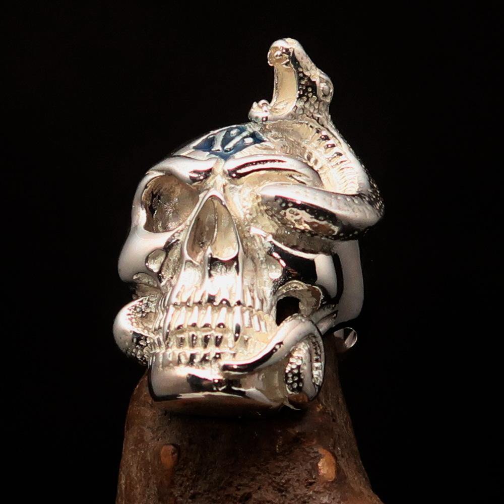 Men's blue 1% Snake Skull Outlaw Ring made of sterling silver with blue enamel accents, showcasing intricate skull design.