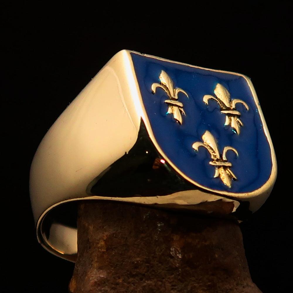 Men's blue Fleur de Lis Coat of Arms Ring made of solid brass with a high polished finish and vibrant blue enamel design.