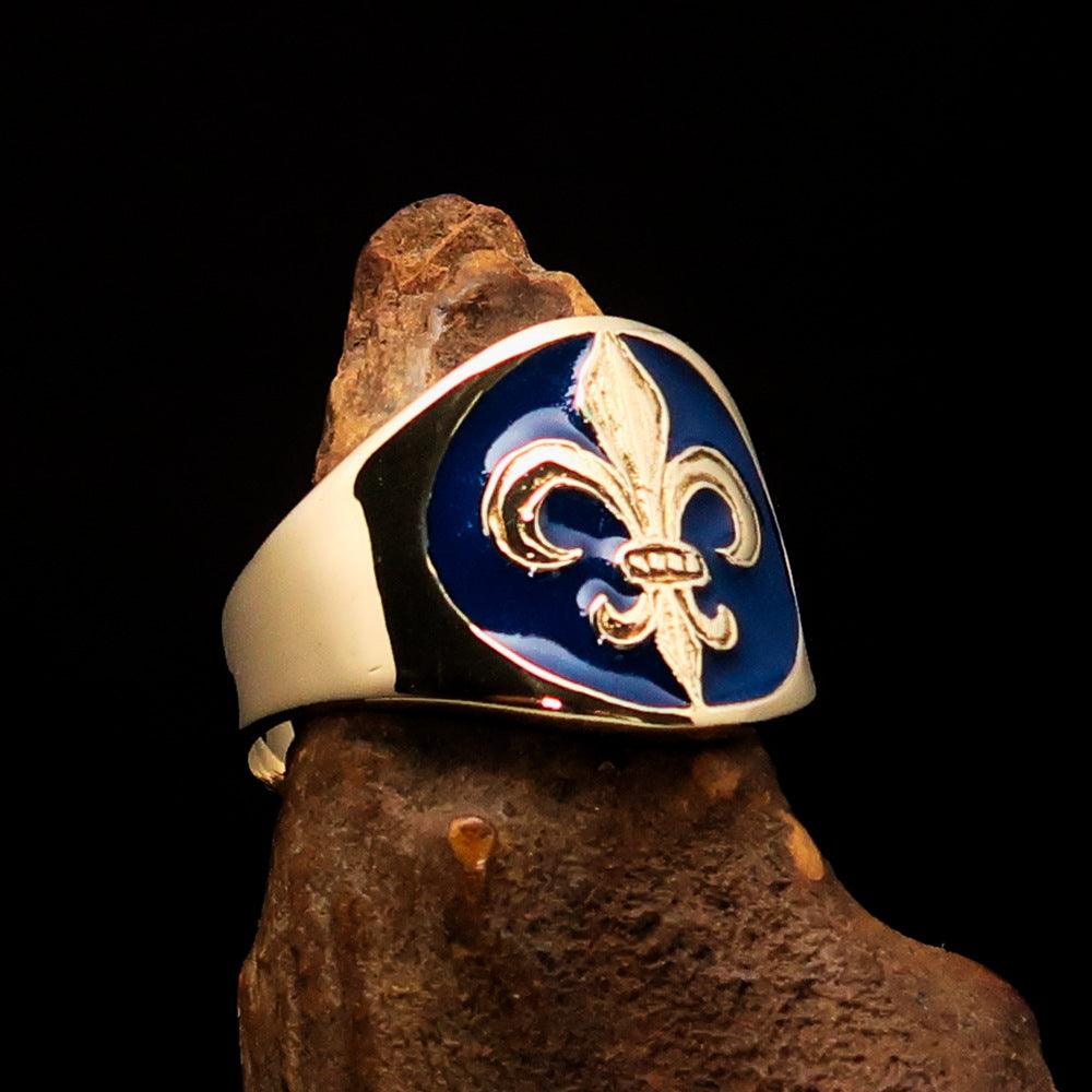 Men's blue Fleur de Lis Seal Pinky Ring made of solid brass with high polish and blue enamel finish, showcasing intricate design.