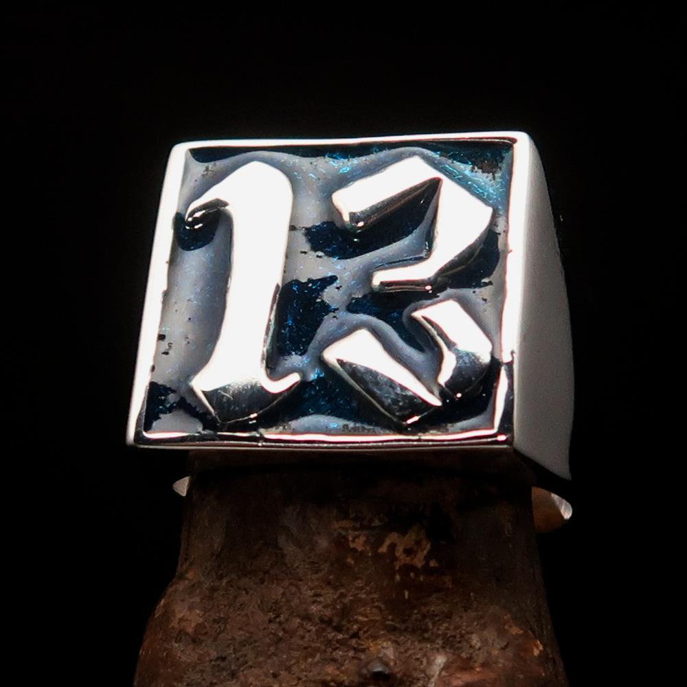 Men's blue lucky number 13 ring made of sterling silver with a polished finish and blue enamel.