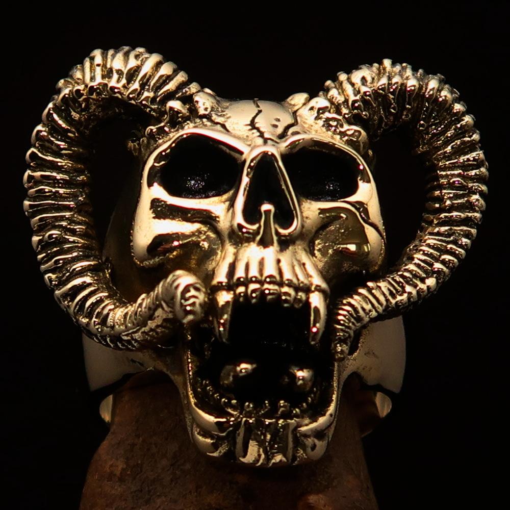 Men's Brass Biker Ring featuring a detailed horned ram skull design, showcasing an antiqued finish and polished accents.
