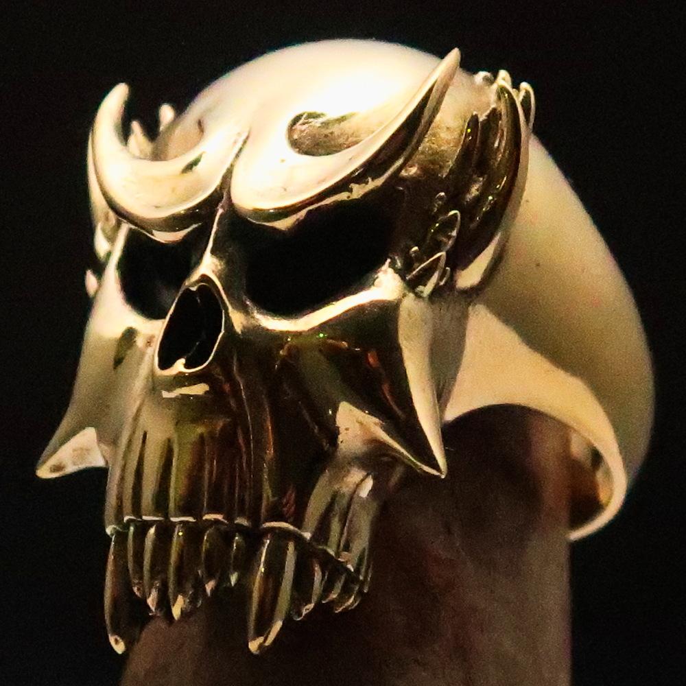 Men's Brass Warlord Biker Ring featuring a detailed vampire skull design, showcasing its intricate craftsmanship and bold style.