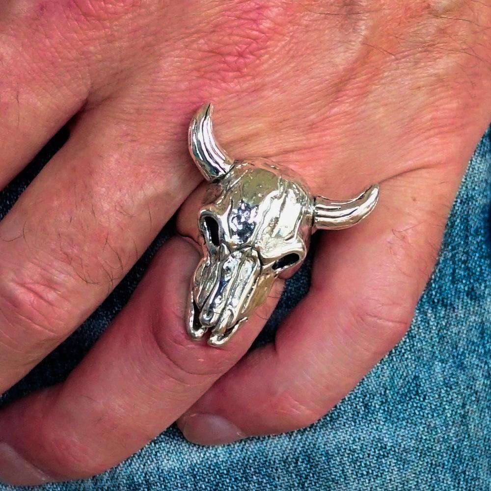 Men's Bull Skull Cowboy Ring made of solid sterling silver with an antiqued and polished finish, showcasing intricate details.