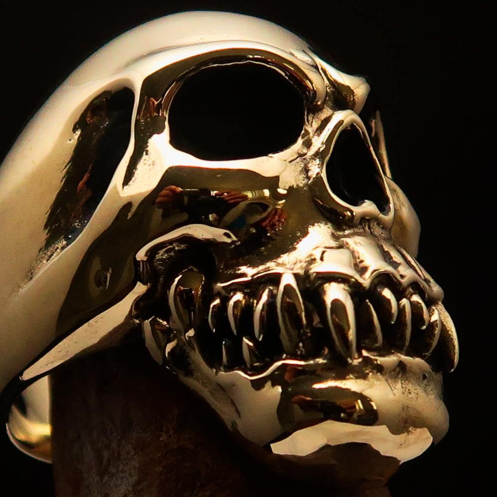 Men's Cannibal Ring featuring a detailed zombie design with fangs, crafted from solid brass with a polished and antiqued finish.