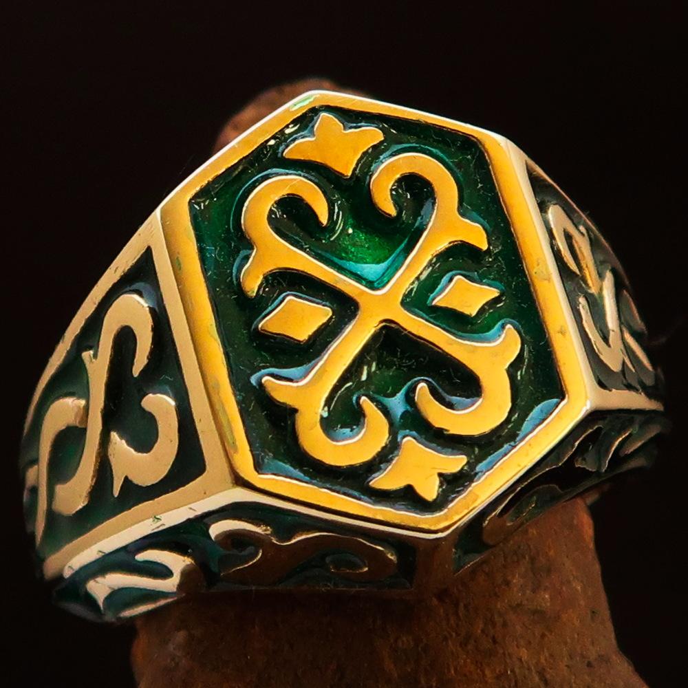 Men's Celtic Crest Ring made of solid brass with vibrant green enamel, showcasing intricate design and high polish finish.