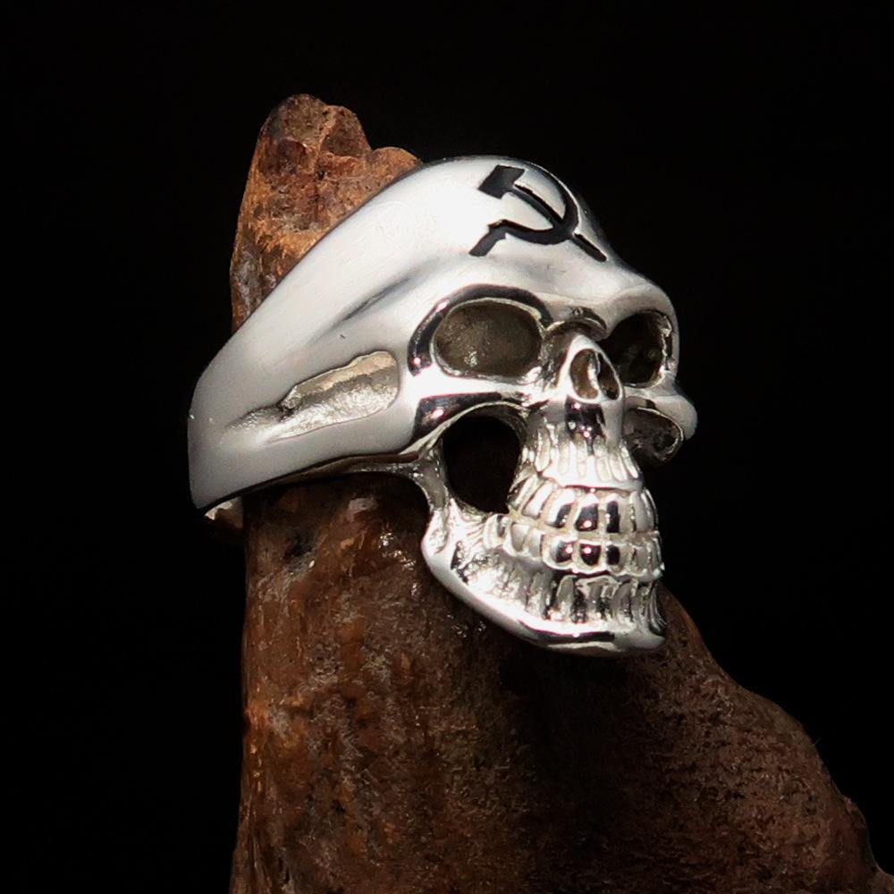 Men's Communist Skull Ring made of solid sterling silver with black enamel hammer and sickle design, showcasing intricate craftsmanship.