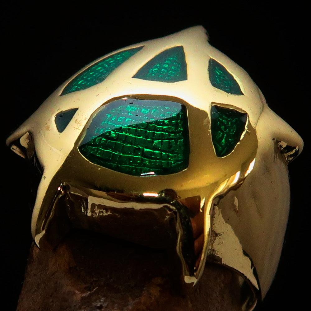 Men's green Anarchy Symbol Ring made of solid brass with high polish and enamel finish, showcasing a bold design.