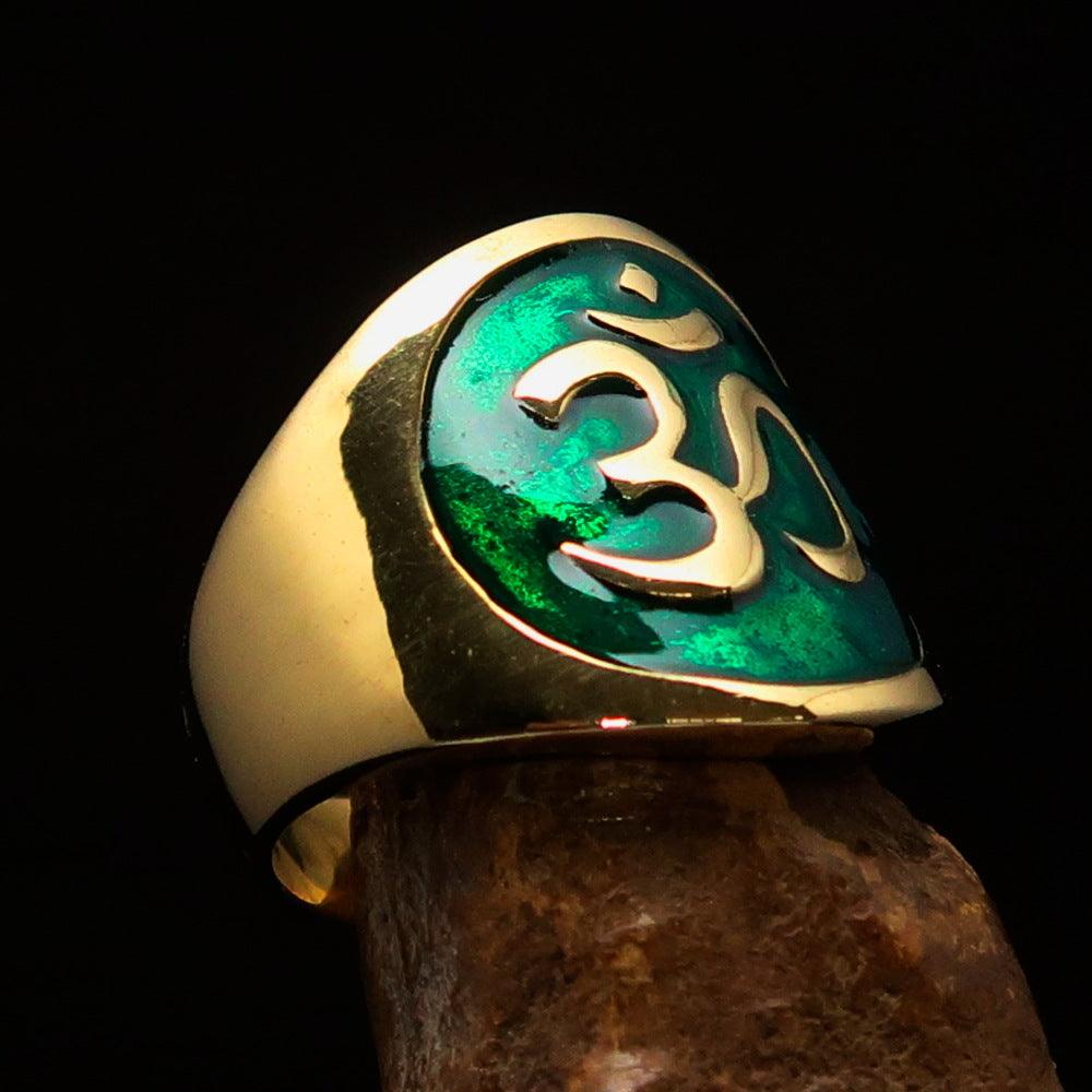 Men's green Aum Buddhist pinky ring made of solid brass with high polished finish and enamel detailing.