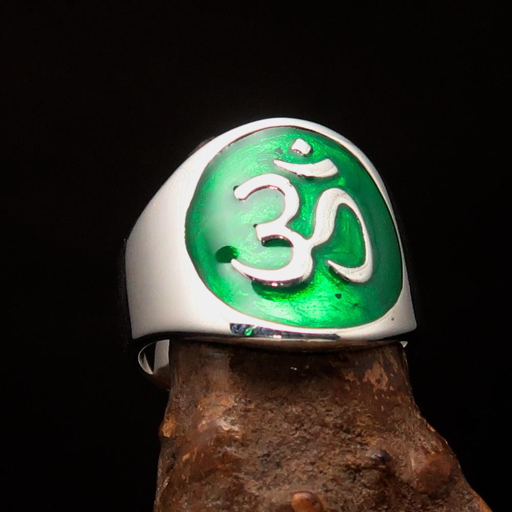 Men's green Aum Buddhist ring made of high-polished sterling silver, featuring a vibrant green Aum symbol.