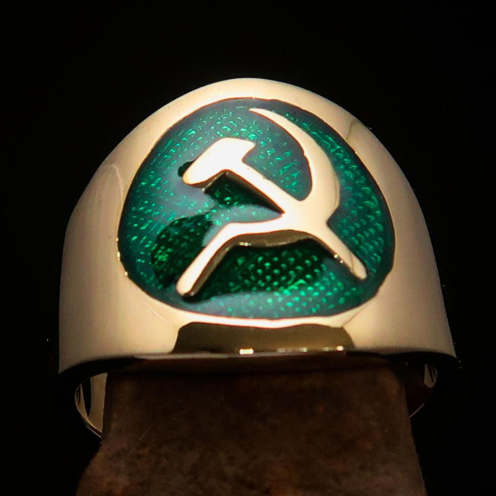 Men's green Hammer and Sickle Crest Ring made of solid brass with high polish and enamel finish, showcasing its unique design.