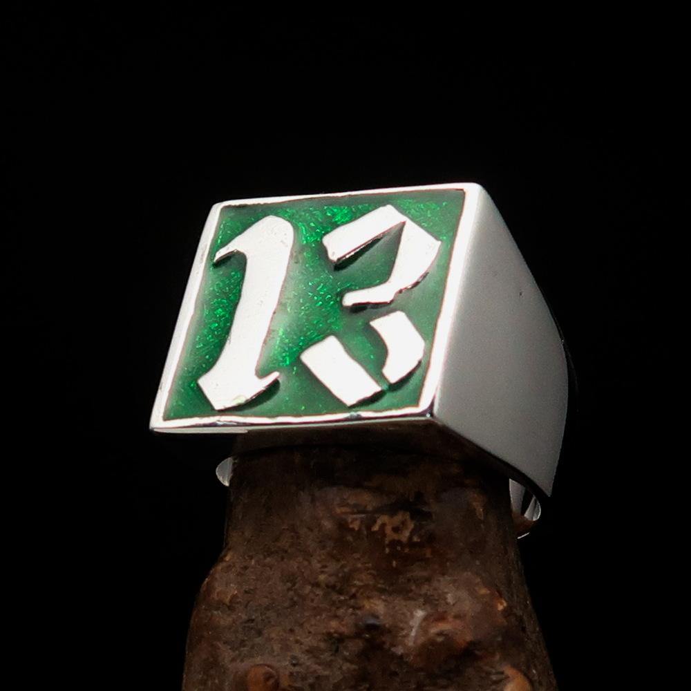 Men's green lucky number 13 ring made of sterling silver with a polished finish and green enamel.
