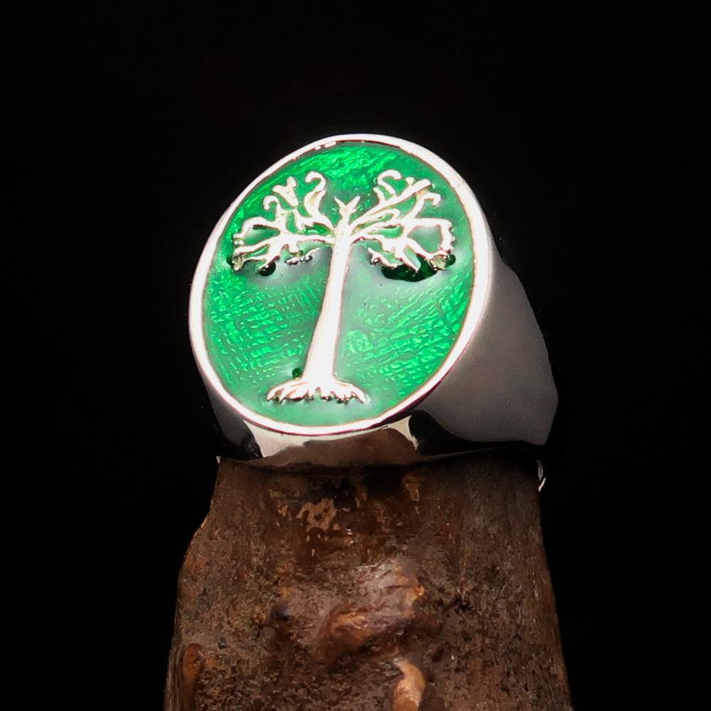 Men's green oval Tree of Life ring made of high-polished sterling silver with green enamel, showcasing intricate design and craftsmanship.