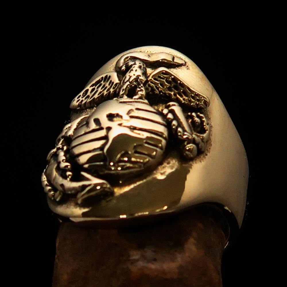 A beautifully crafted Men's Marine's Military Ring made of solid brass, featuring an antiqued and mirror-polished finish, showcasing its elegant design.