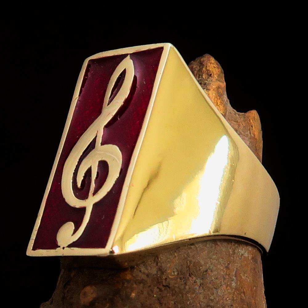 Men's Musician Ring featuring a red Treble Clef symbol, crafted from solid brass with a high polished finish and enamel.