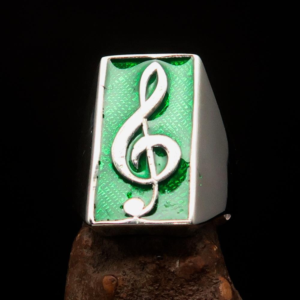 Men's Musician Ring in sterling silver featuring a green Treble Clef symbol, showcasing high polish and enamel finish.