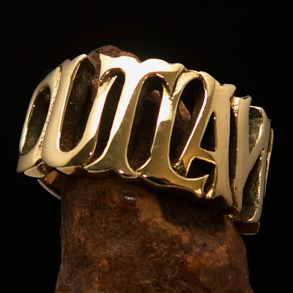 Men's One Word Outlaw Biker Ring made of solid brass with a high polished finish, showcasing its bold design and craftsmanship.