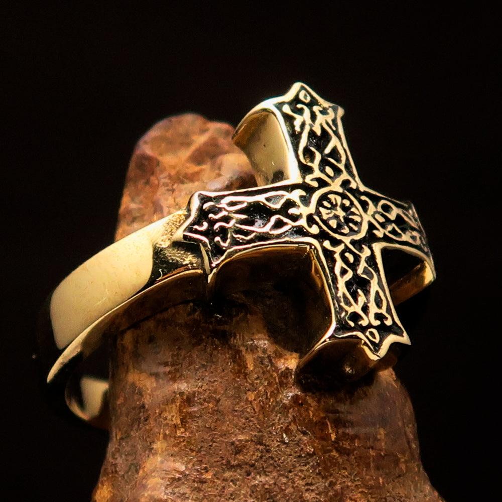 Men's ornamental Celtic Cross Ring in antiqued brass, showcasing intricate design and polished finish.
