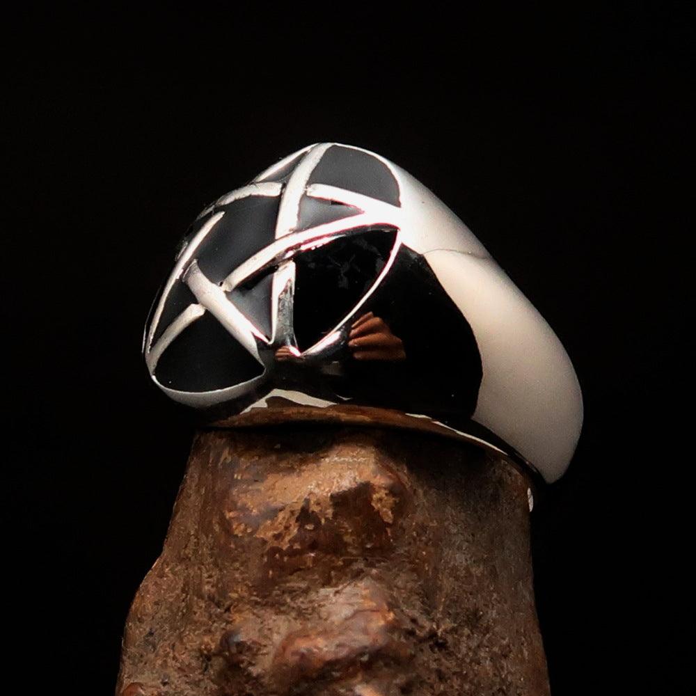 Men's sterling silver pinky ring featuring a domed black pentagram design, polished finish, and solid back.