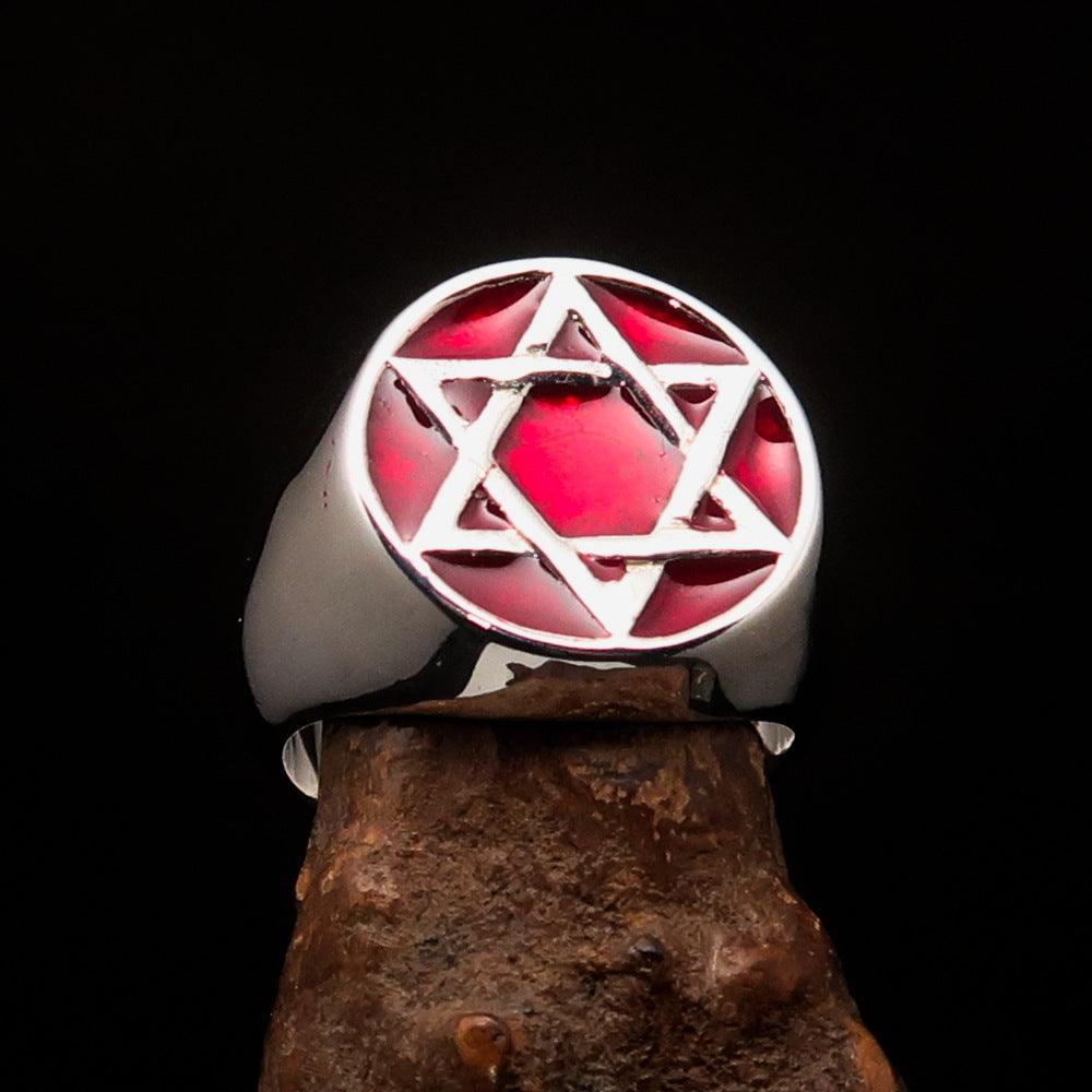 Men's pinky ring made of sterling silver featuring a red Star of David design, polished finish, and solid back.