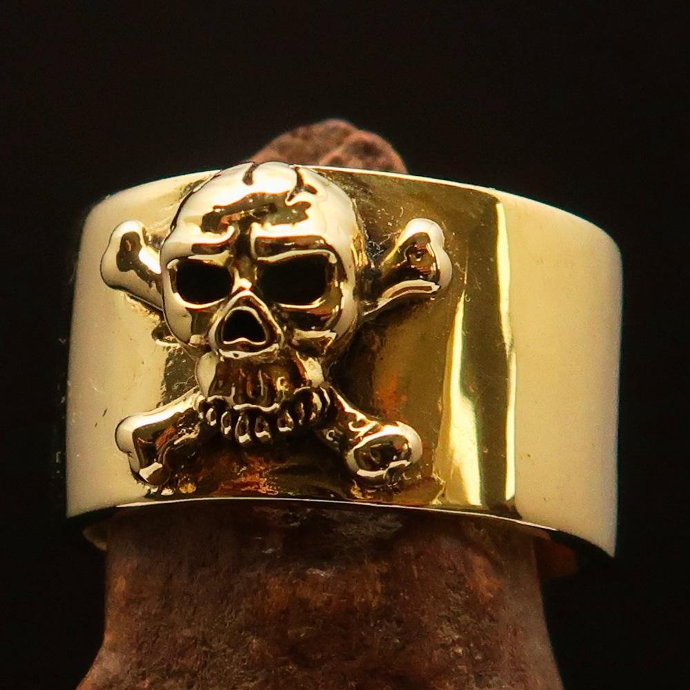 Men's Pirate Band Ring featuring a detailed Jolly Roger Skull design, crafted from solid brass with a high polished and antiqued finish.