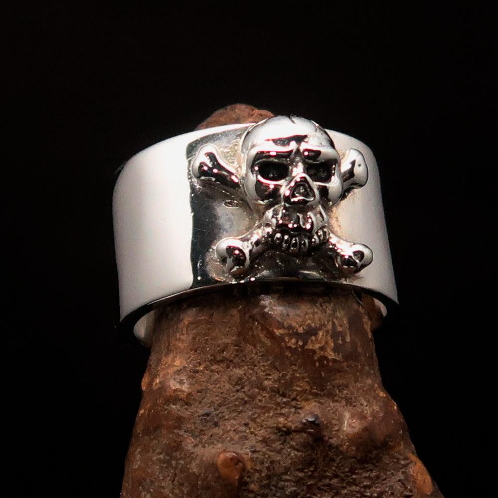 Men's Pirate Band Ring featuring a Jolly Roger Skull design, crafted from high-quality sterling silver with a polished and antiqued finish.