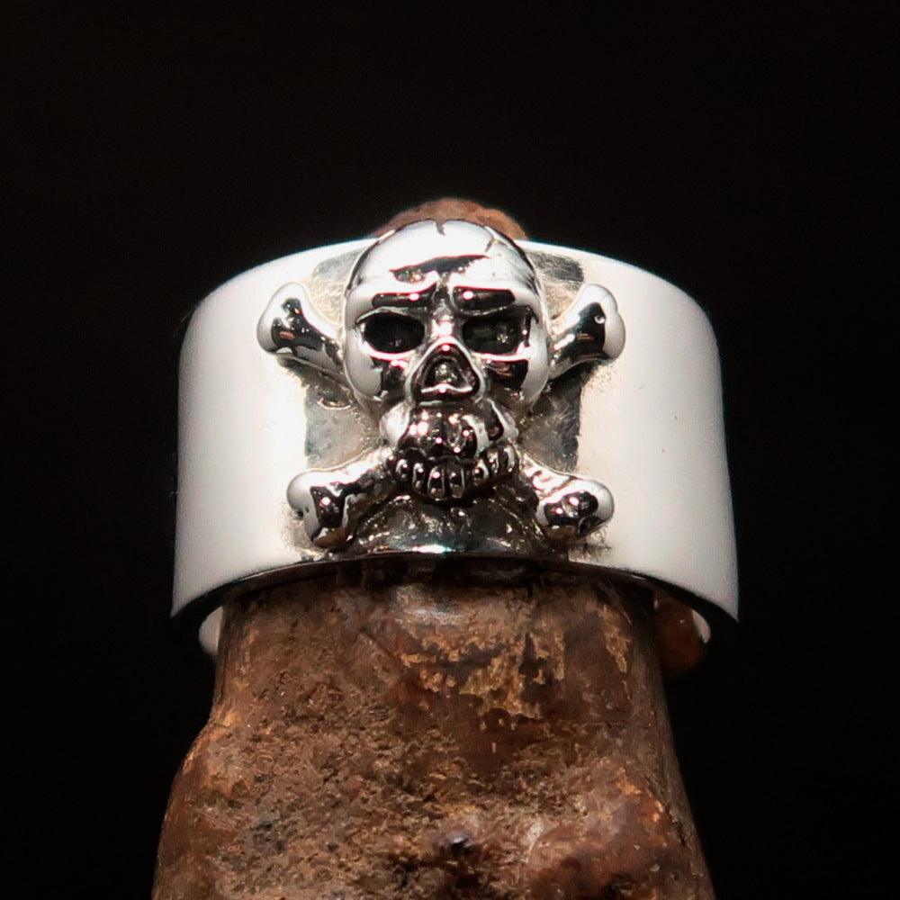 Men's Pirate Band Ring featuring a Jolly Roger Skull design, crafted from high-quality sterling silver with a polished and antiqued finish.