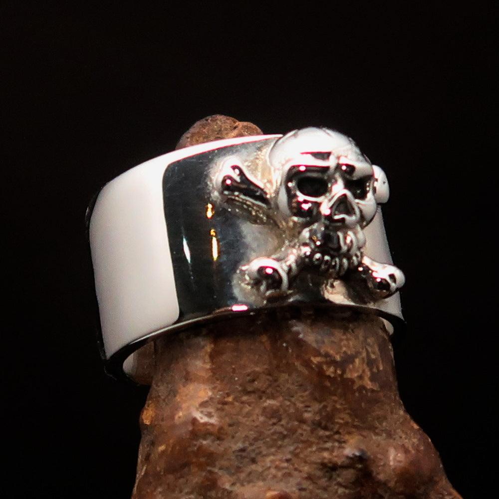 Men's Pirate Band Ring featuring a Jolly Roger Skull design, crafted from high-quality sterling silver with a polished and antiqued finish.