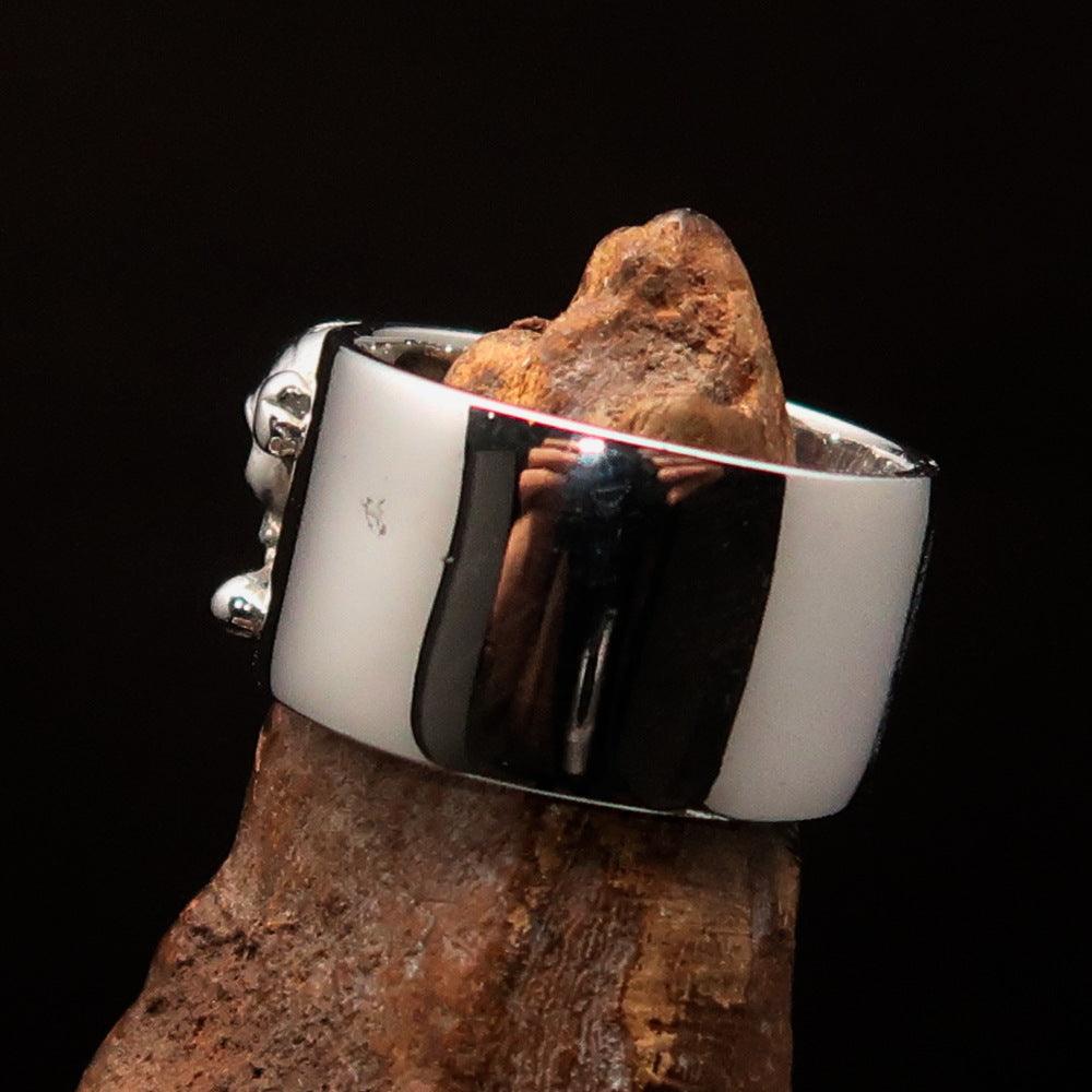 Men's Pirate Band Ring featuring a Jolly Roger Skull design, crafted from high-quality sterling silver with a polished and antiqued finish.