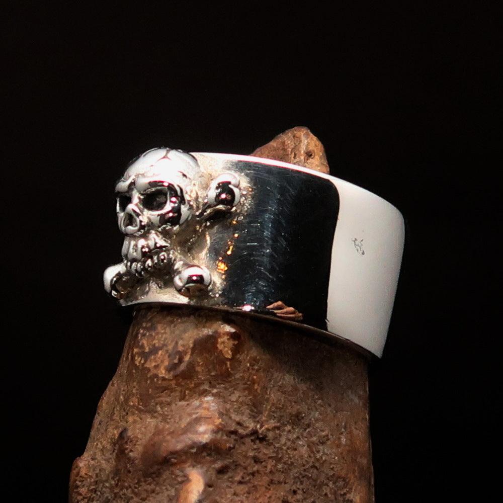 Men's Pirate Band Ring featuring a Jolly Roger Skull design, crafted from high-quality sterling silver with a polished and antiqued finish.