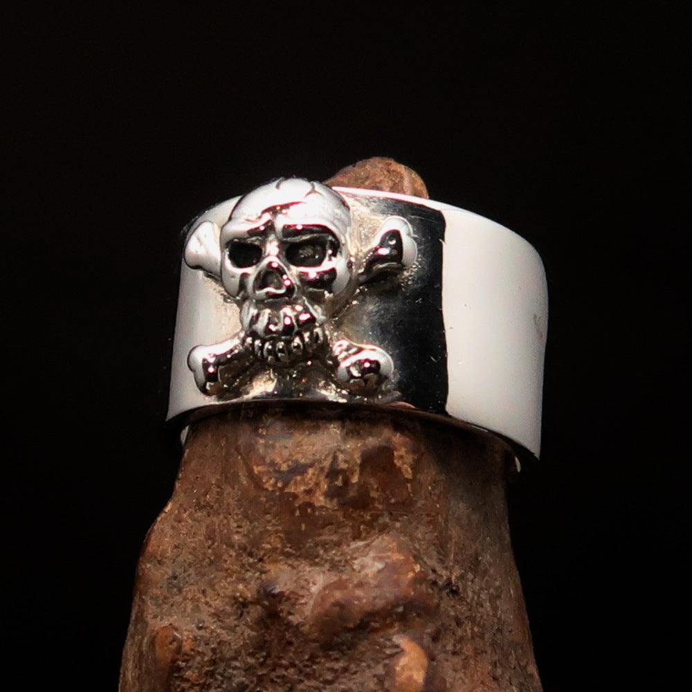 Men's Pirate Band Ring featuring a Jolly Roger Skull design, crafted from high-quality sterling silver with a polished and antiqued finish.